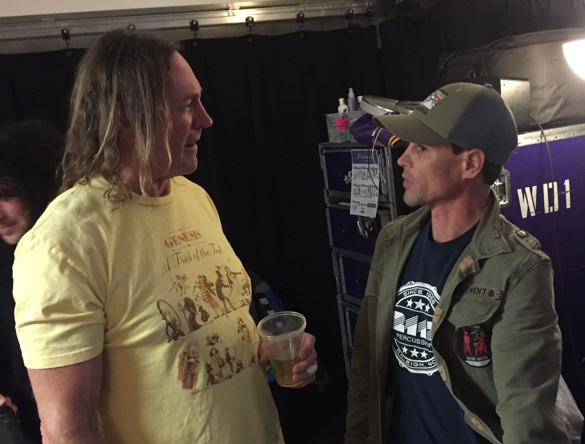 Danny Carey talking with Cameron Brown