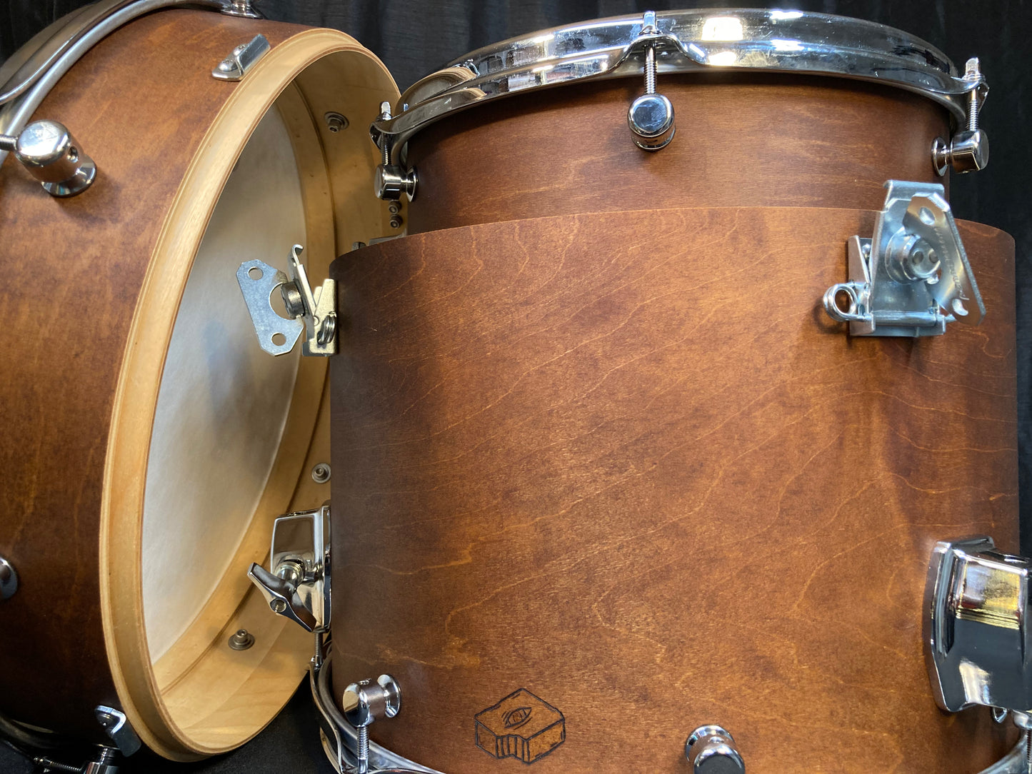 Nesting compact drums in natural brown finish