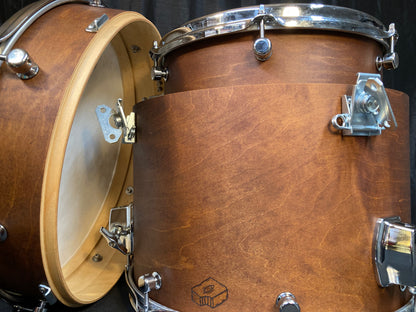 Nesting compact drums in natural brown finish