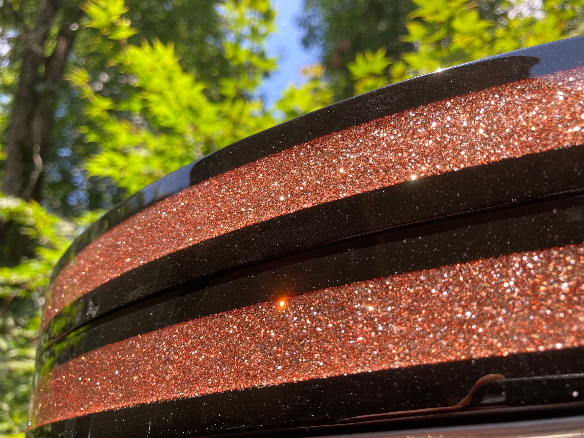 closeup view of a pair of vintage style bass drum hoops in champagne sparkle