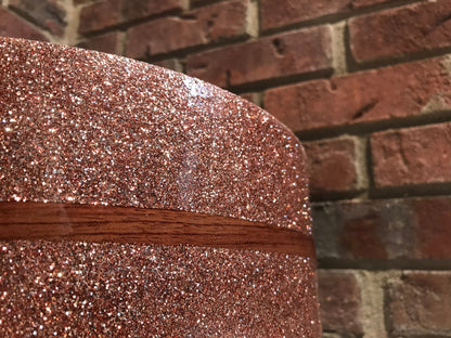 snare drum finish with Bubinga middle band in champagne sparkle metal flake