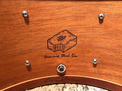 handmade snare drum made of mahogany wood with Brownie Drum Co. logo and caption reading "Brownie Mud Pie"