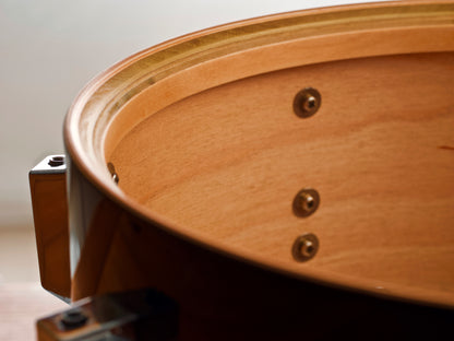 Interior view of a custom snare drum made of birch wood