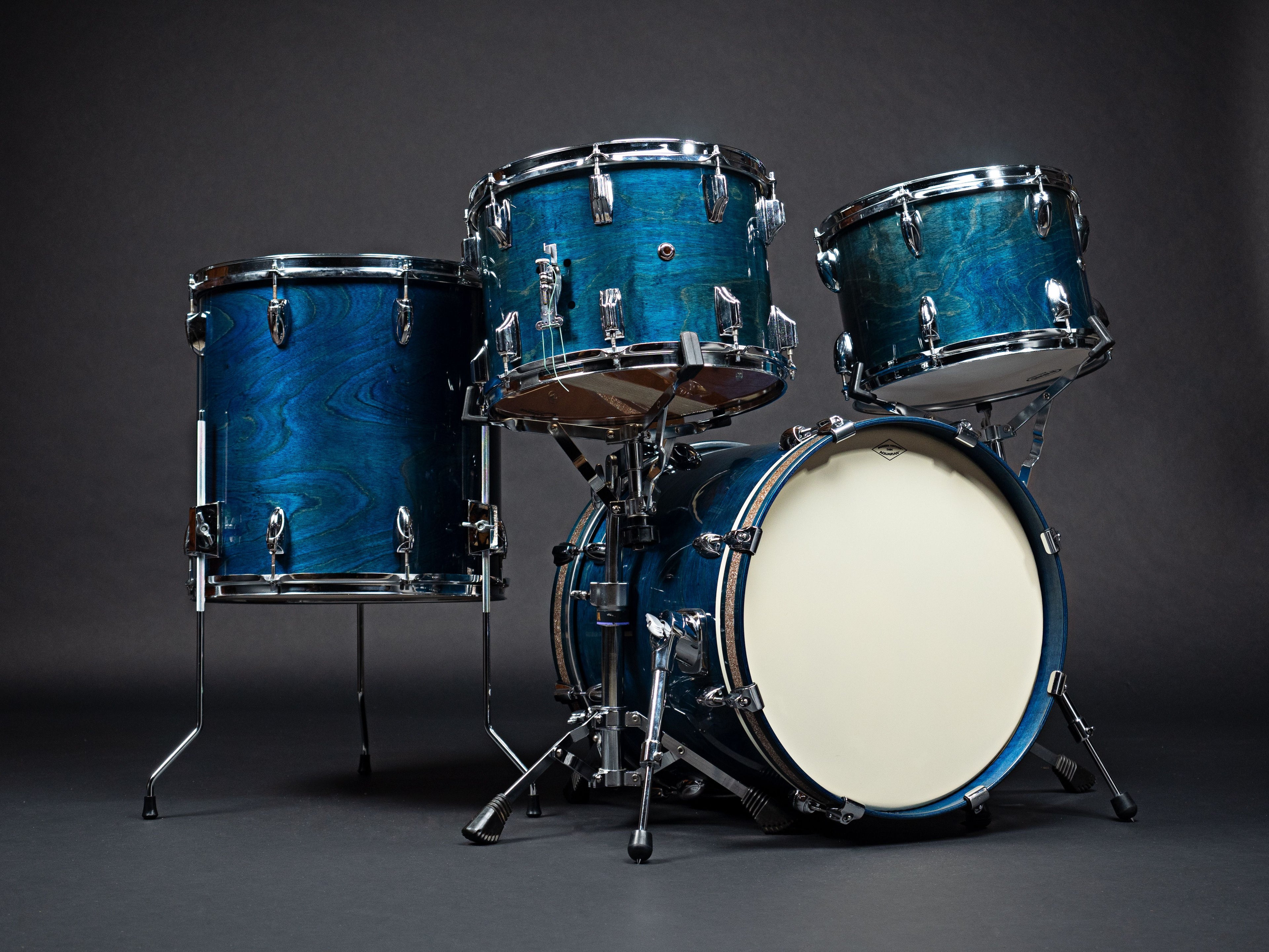 Yamaha drum kit refinished in a blue color dye with high gloss clear coat