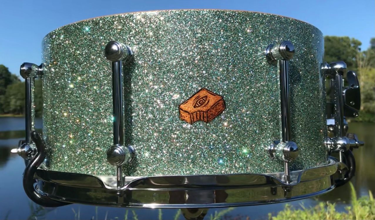 hand made snare drum with chrome hardware and blue sparkle metal flake finish