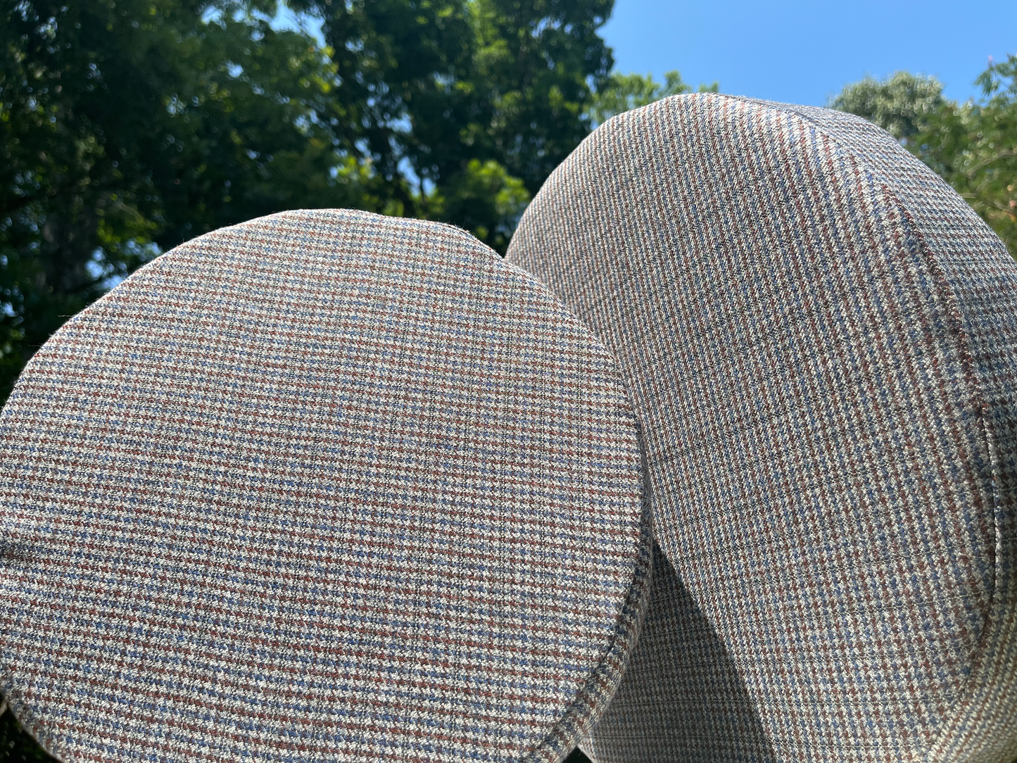 Circular cushions with stitched fabric