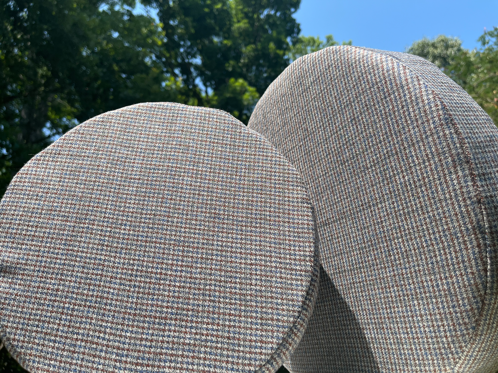 Circular cushions with stitched fabric