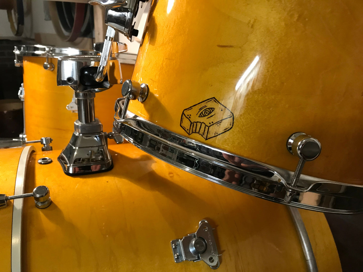 close-up view of a Brownie Drum Co nesting drum set finished in honey amber 