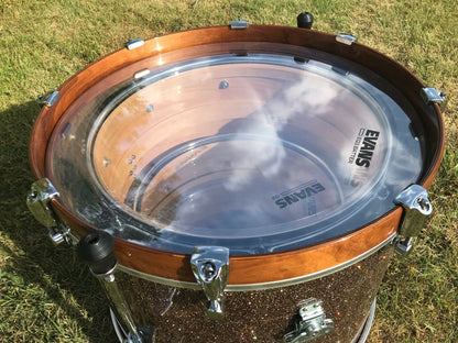 brownie drum company nesting drum set shown with drum shells nested inside one another