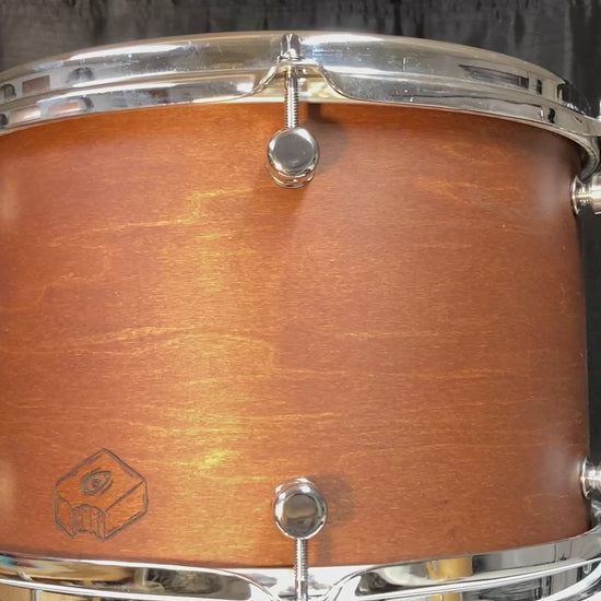Custom maple drum shell with brown stain