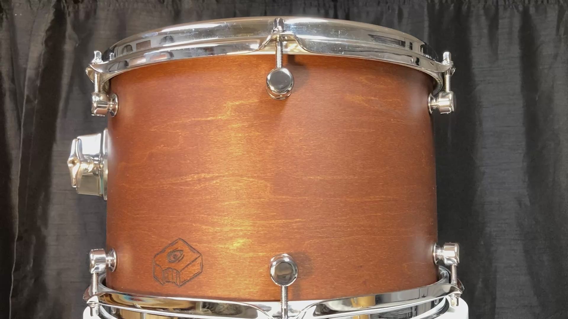 Custom maple drum shell with brown stain